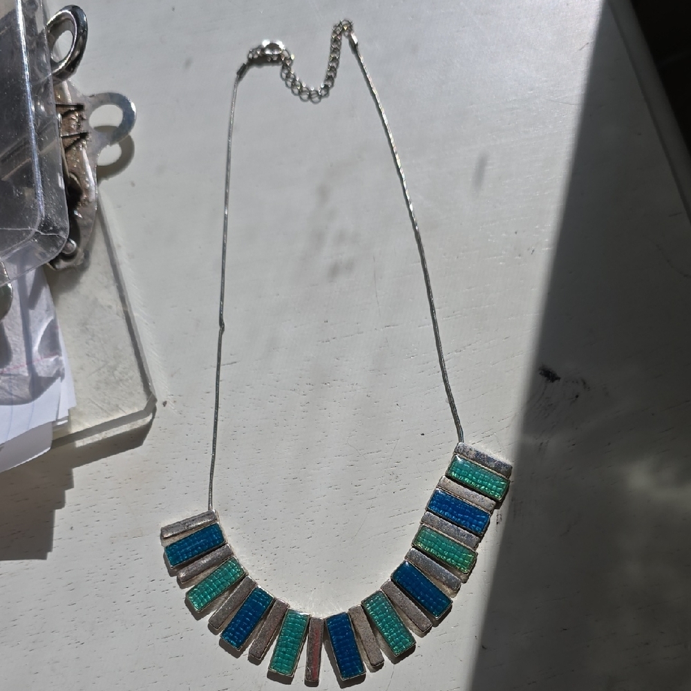 Elegant Silver Necklace with Blue and Green Details